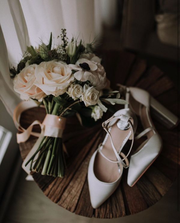 Photo of Perfect Bridal Kiera Dyeable Ivory Satin Cross Strap Block Heel Courts uploaded by E on 20th April 2023