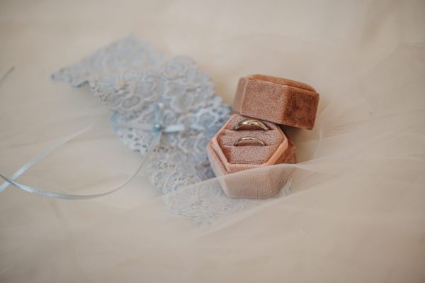 Photo of Purity Blue Delicate Lace Wedding Garter with Pearl Detail uploaded by O on 24th July 2023