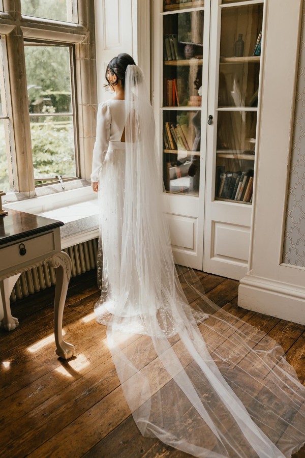 Photo of Bianco Ivory Plain Single Tier Cathedral Veil with Cut Edge S261 uploaded by V on 24th June 2024