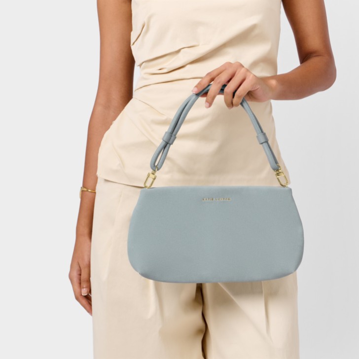 Katie Loxton Borsa da polso Asha Blue Mist Suedette