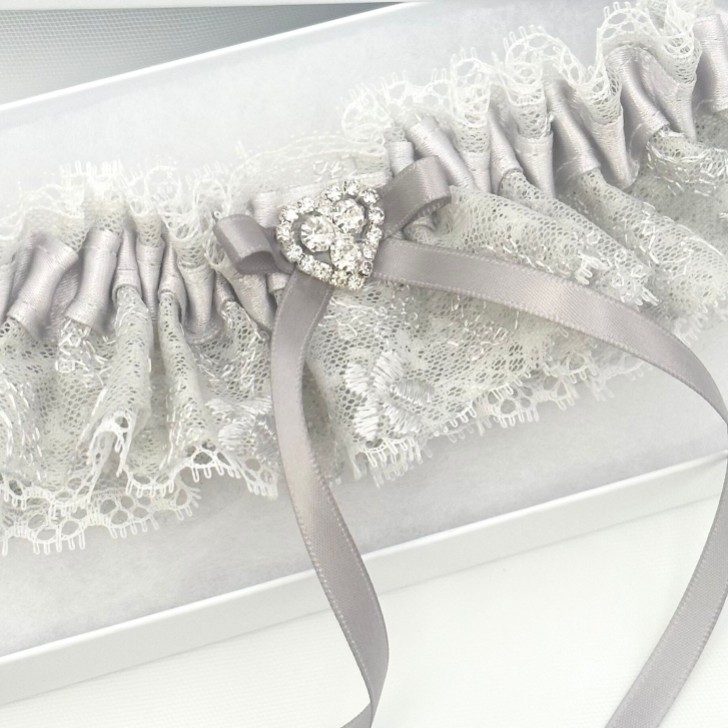 Surrender Silver Satin and Lace Garter with Crystal Heart and Bow Detail