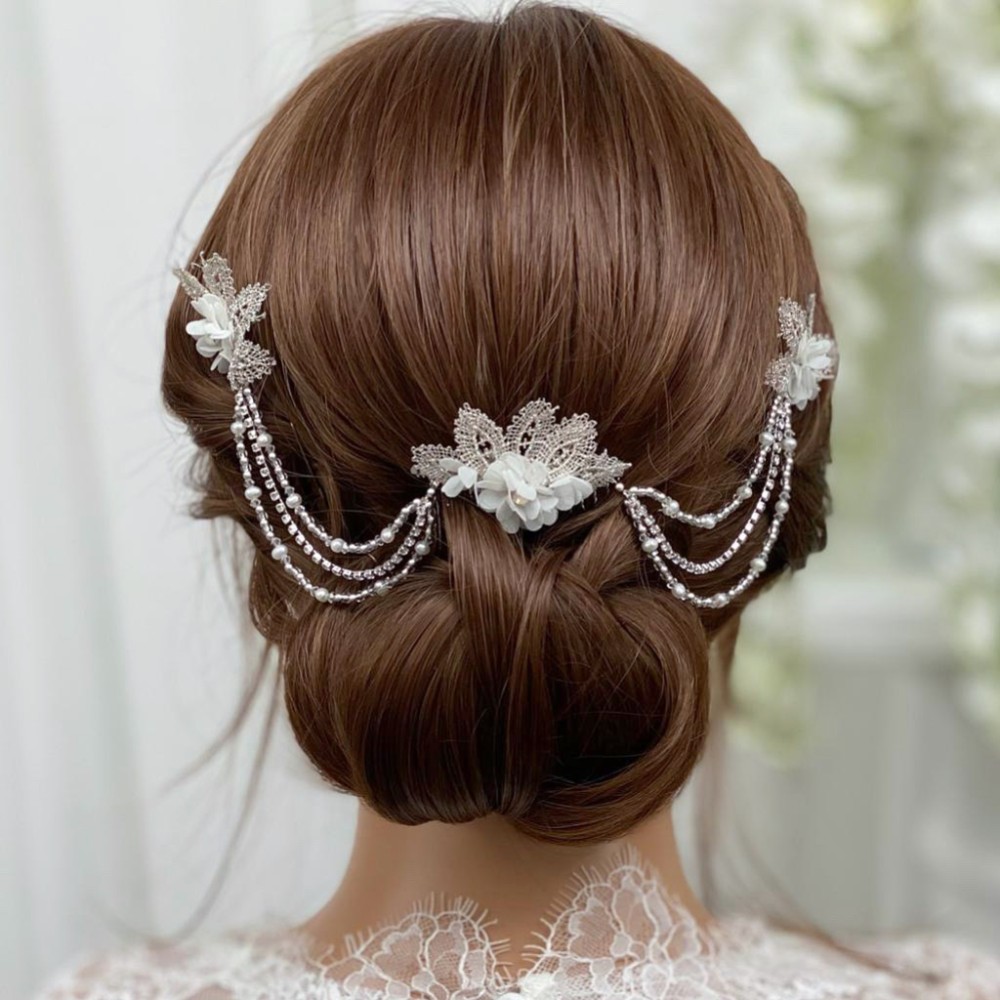 Photograph: Amelia Silver Lace Leaves and Opal Crystal Floral Hair Drape