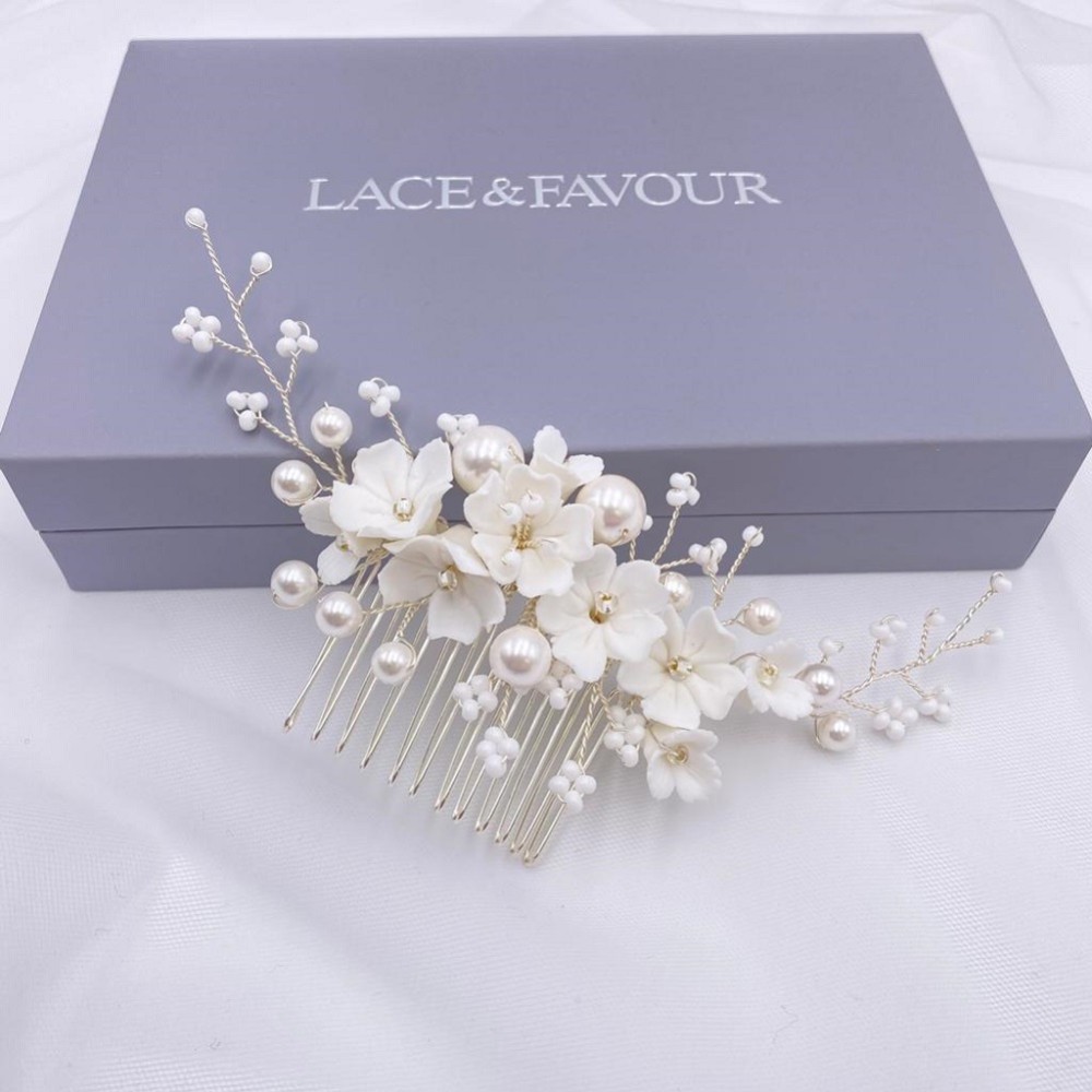 Photograph of Anemone Ivory Porcelain Flowers and Pearl Wedding Hair Comb (Silver)