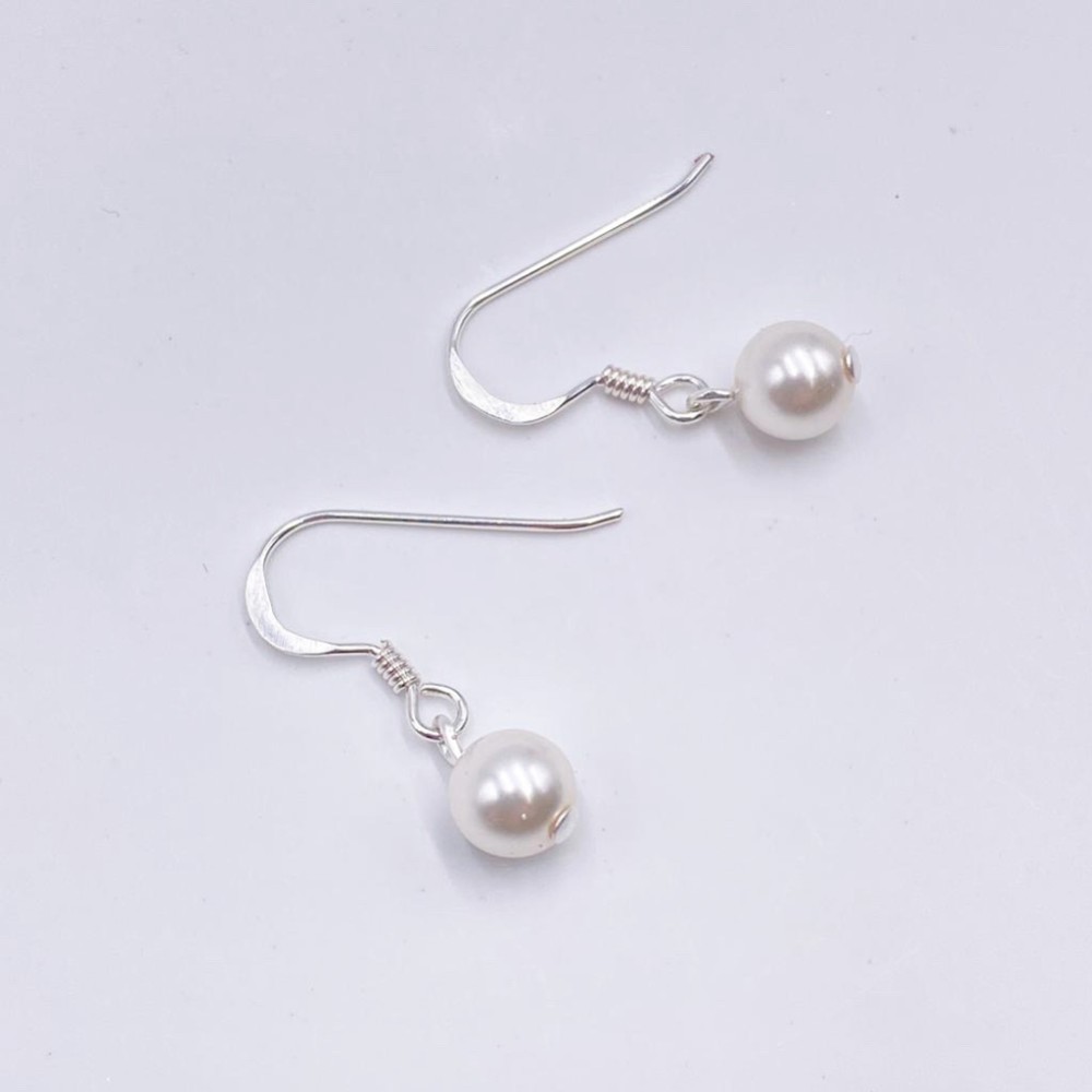 Photograph of Arianna Simple Pearl Drop Earrings