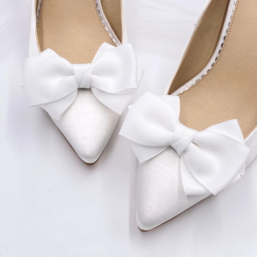 Photograph of Betsy Large Ivory Ribbon Bow Shoe Clips