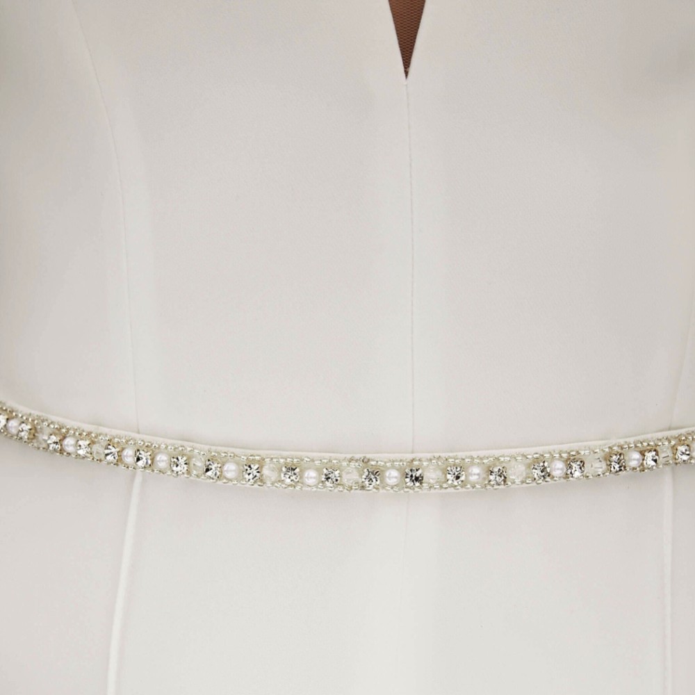 Photograph of Bianco Narrow Pearl Embellished Satin Bridal Dress Belt