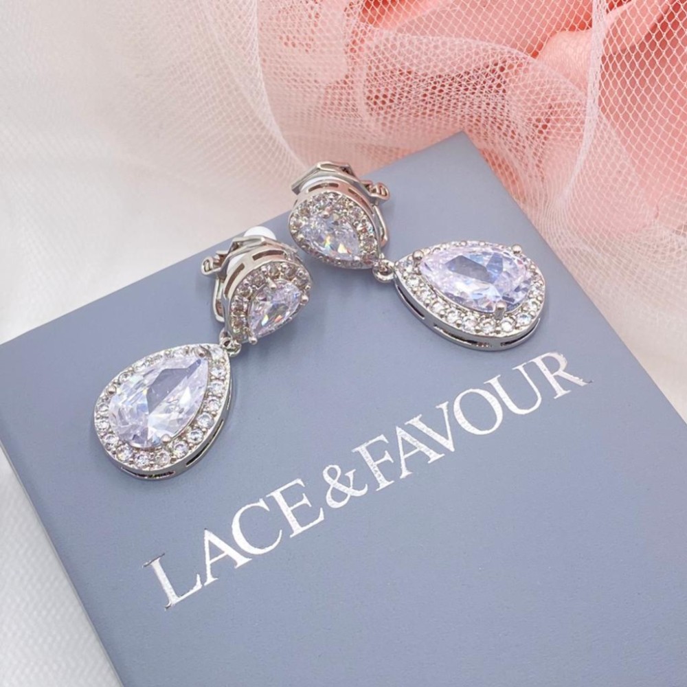 Photograph of Celeste Clip On Silver Crystal Embellished Wedding Earrings