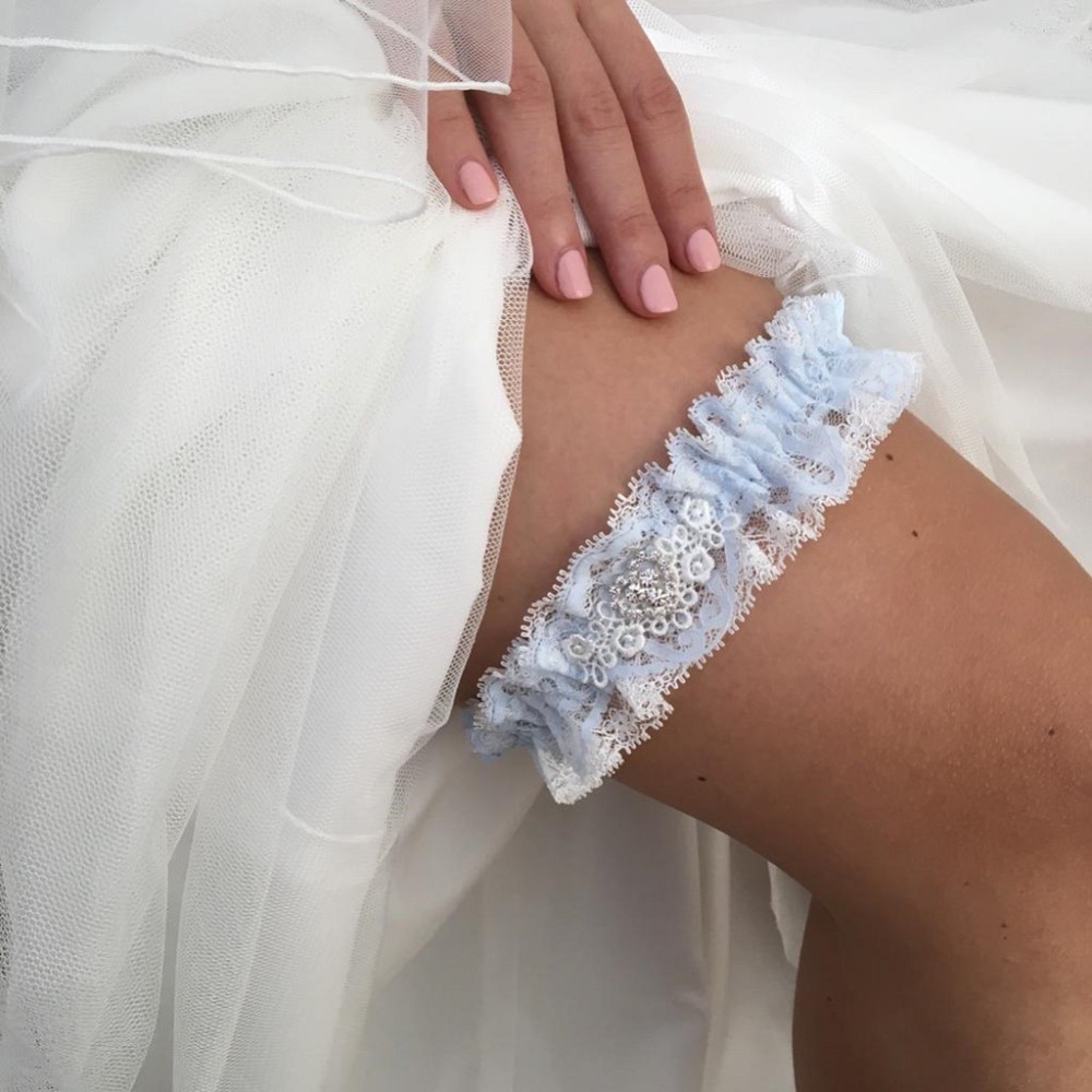 Photograph of Desire Blue and Ivory Lace Bridal Garter with Crystal Heart Detail