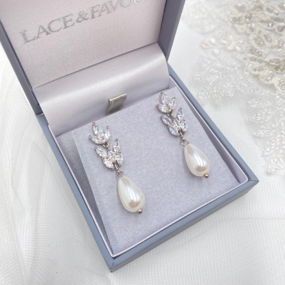 Photograph of Divine Silver Cubic Zirconia and Teardrop Pearl Earrings