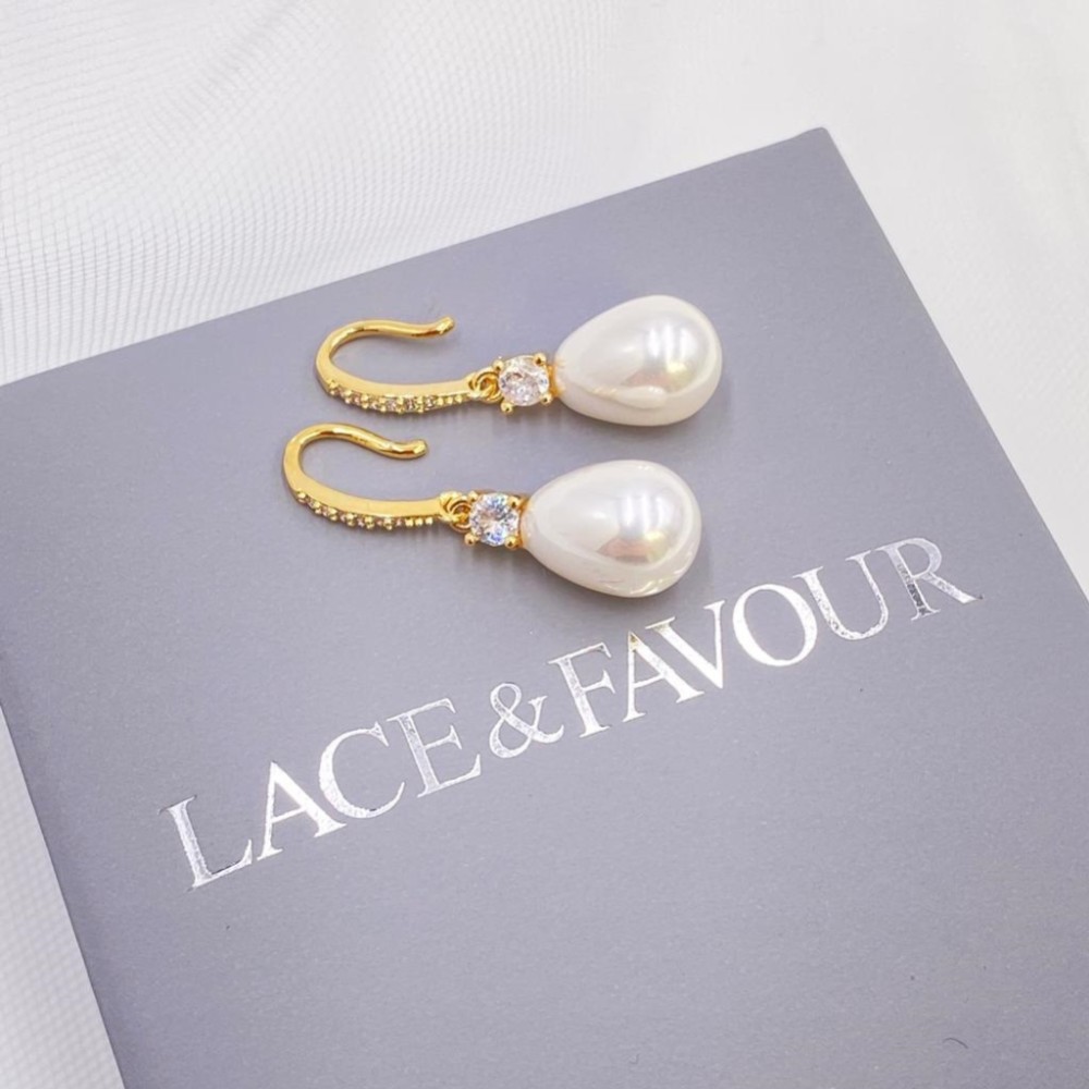 Photograph of Dolci Gold Crystal Embellished Teardrop Pearl Earrings