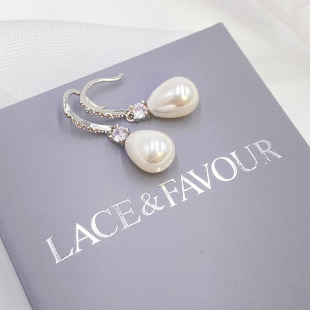 Photograph of Dolci Silver Crystal Embellished Teardrop Pearl Earrings