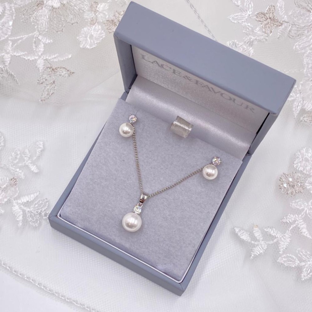 Photograph of Evie Dainty Pearl Stud Earring and Pendant Jewellery Set