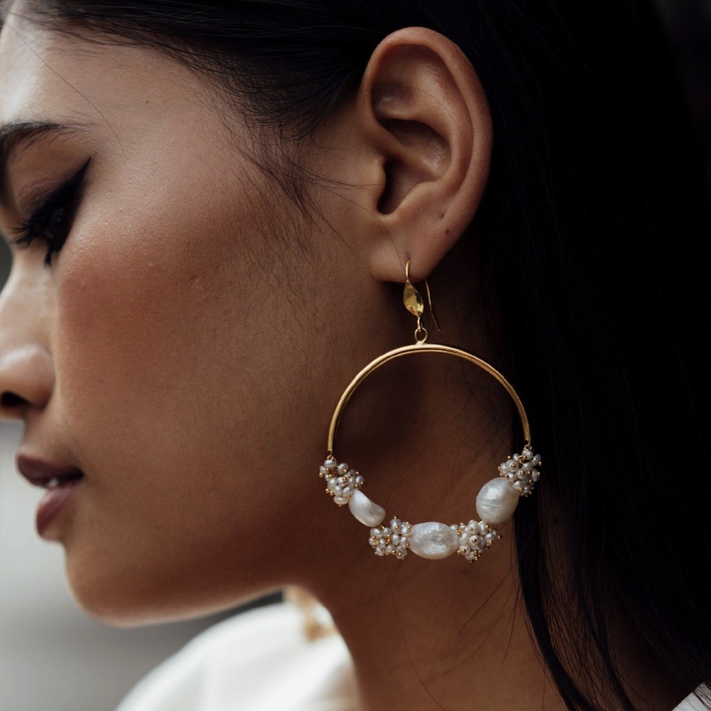 Photograph: Freya Rose Seed and Baroque Pearl Large Hoop Earrings