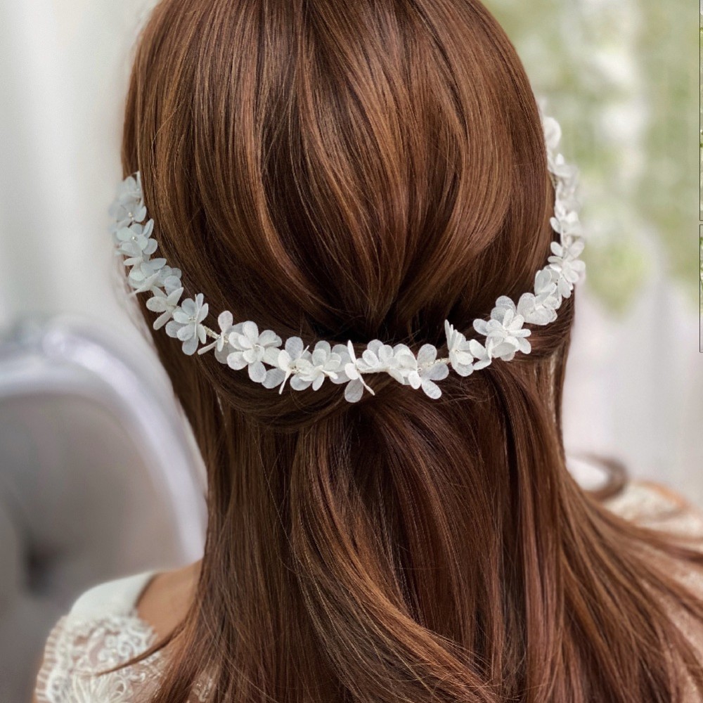 Photograph of Hailey Long Ivory Flower Wedding Hair Vine