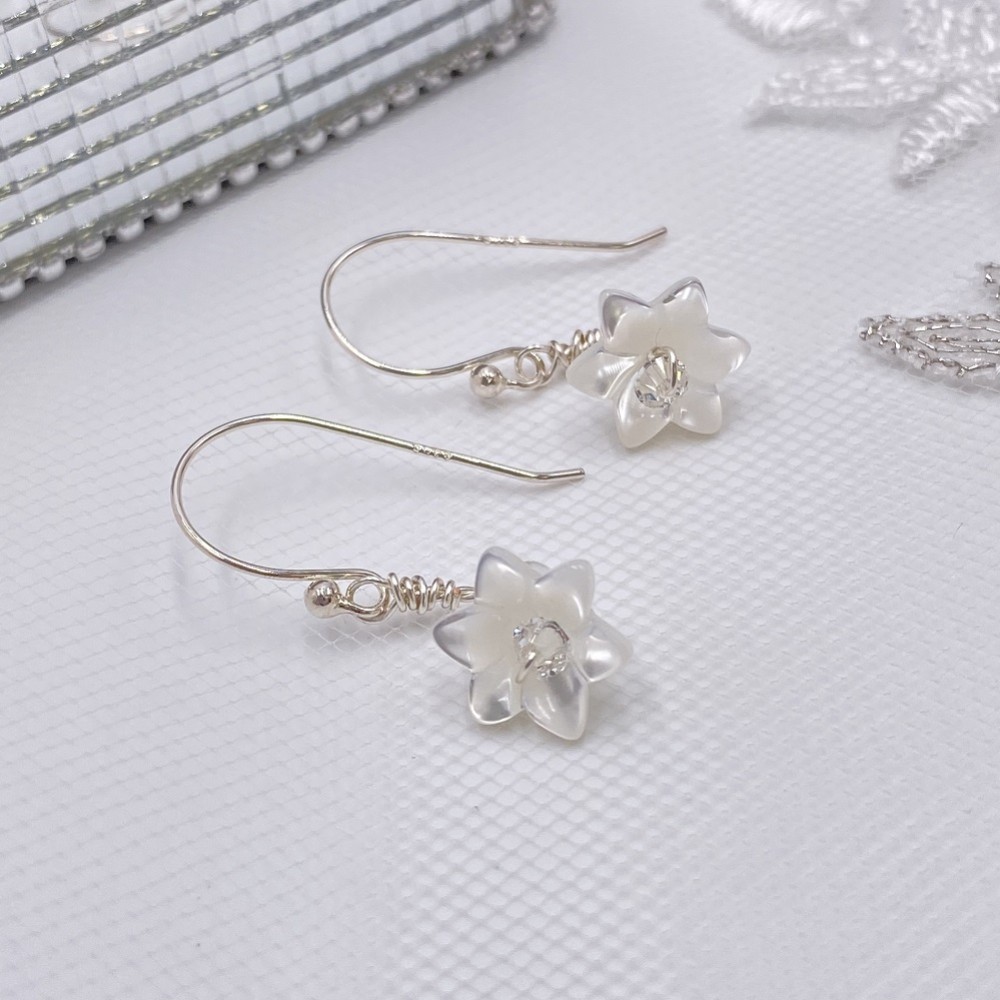 Photograph: Hermione Harbutt Violette Silver Mother of Pearl Flower Earrings