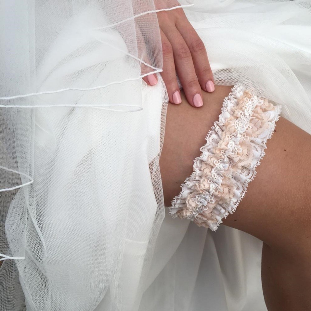 Photograph of Honesty Blush and Ivory Lace Luxury Bridal Garter