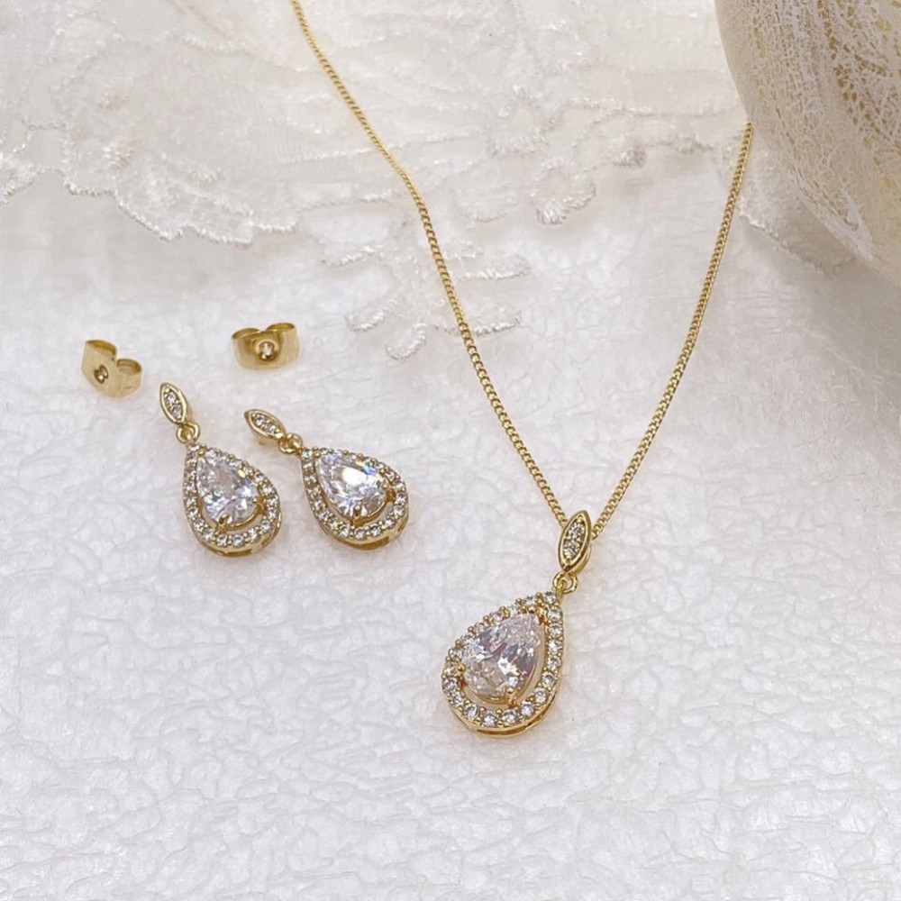 Photograph of Ivory and Co Belmont Gold Crystal Bridal Jewellery Set
