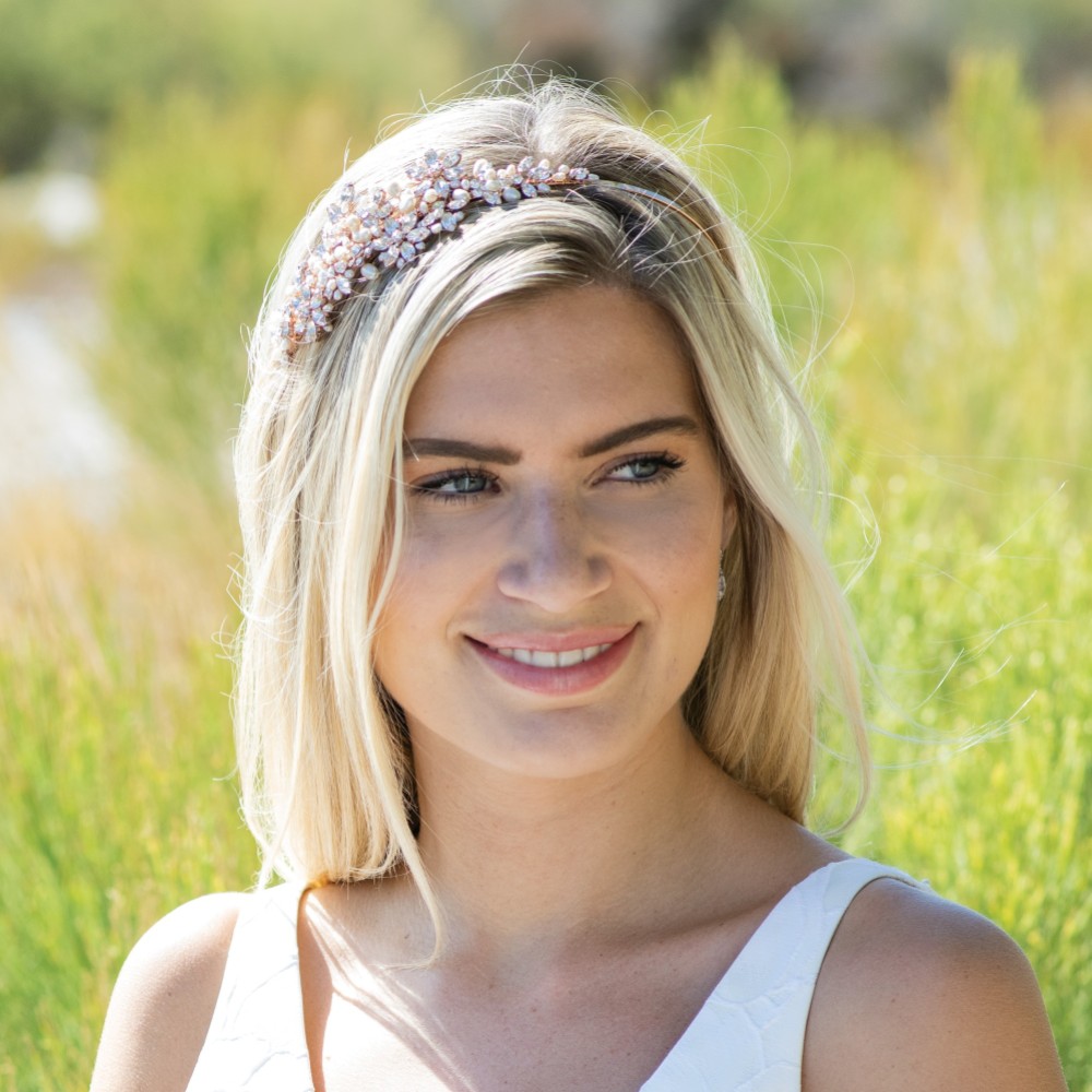 Photograph: Ivory and Co Charade Rose Gold Crystal Blossom and Pearl Headband