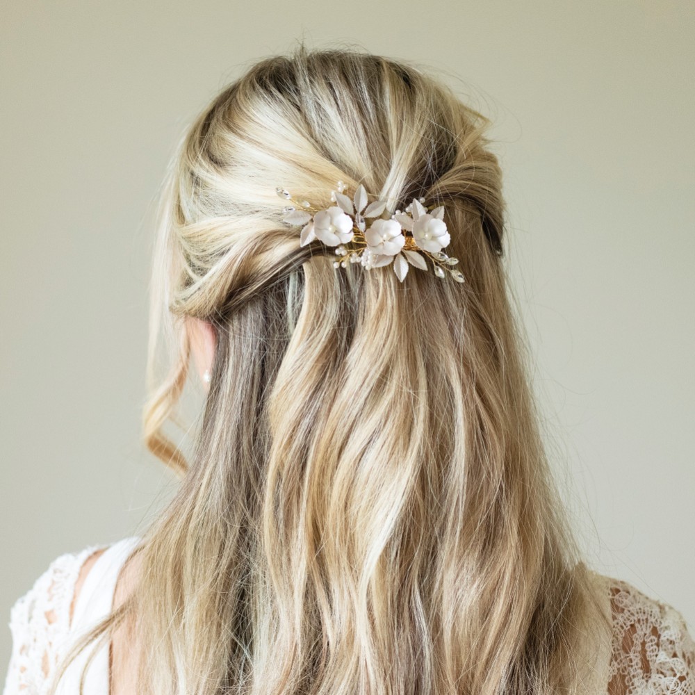 Photograph: Ivory and Co Gardenia Gold Dainty Crystal and Pearl Floral Hair Clip