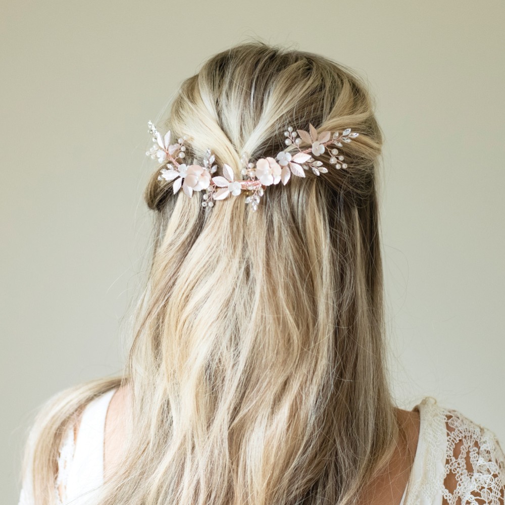 Photograph of Ivory and Co Rose Gold Bloom Crystal and Pearl Floral Crescent Hair Clip