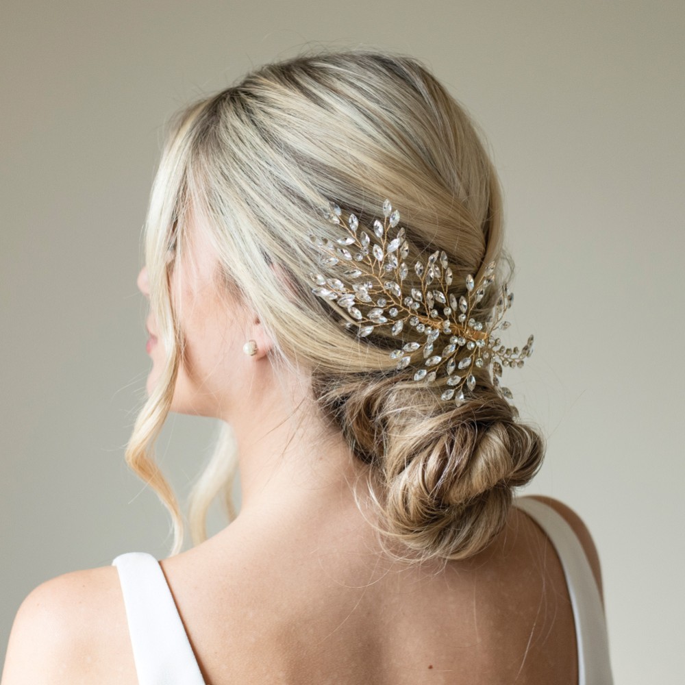 Photograph of Ivory and Co Serenade Gold Statement Crystal Spray Wedding Hair Clip