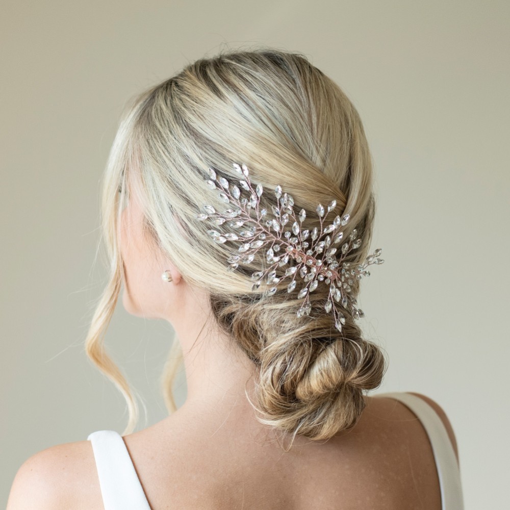 Photograph of Ivory and Co Serenade Rose Gold Statement Crystal Spray Wedding Hair Clip