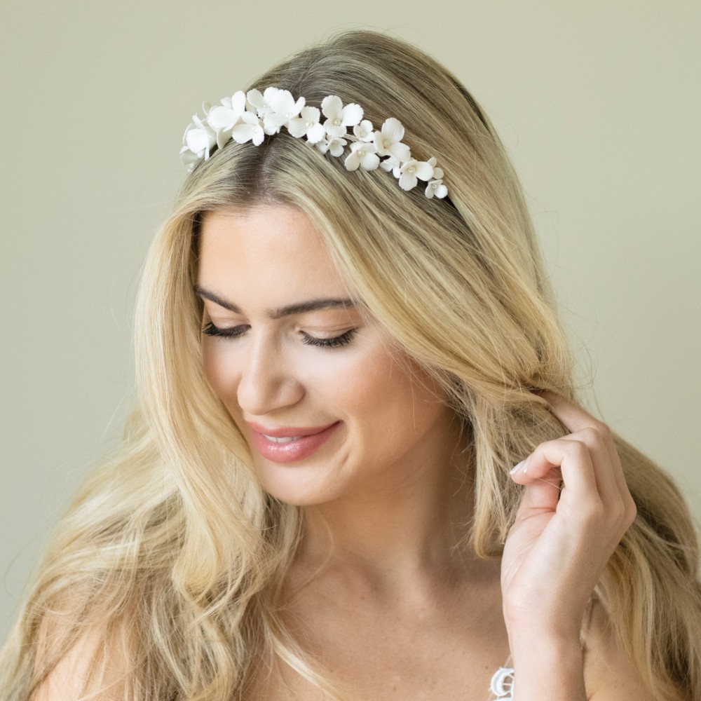 Photograph of Ivory and Co Wildflower Ceramic and Pearl Floral Wedding Headpiece