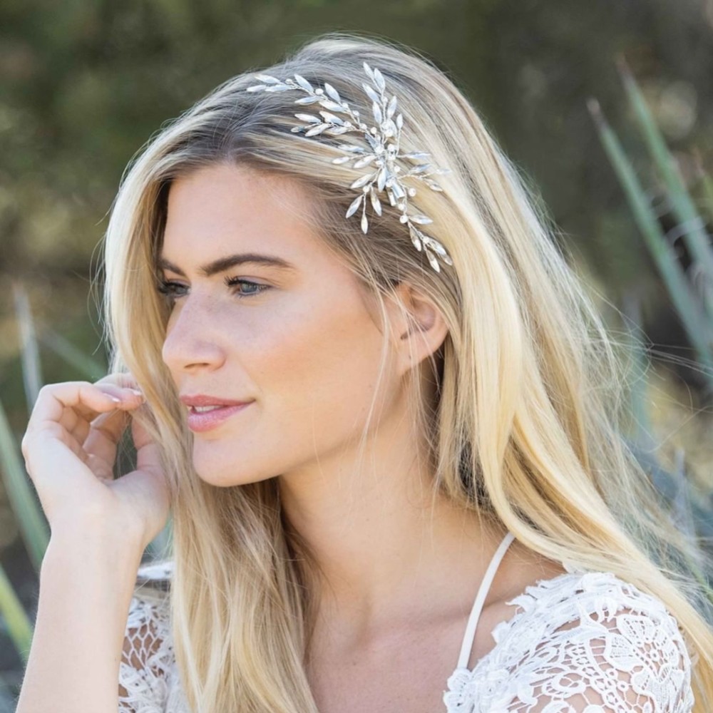 Photograph: Ivory and Co Wintersweet Crystal Spray Wedding Hair Clip