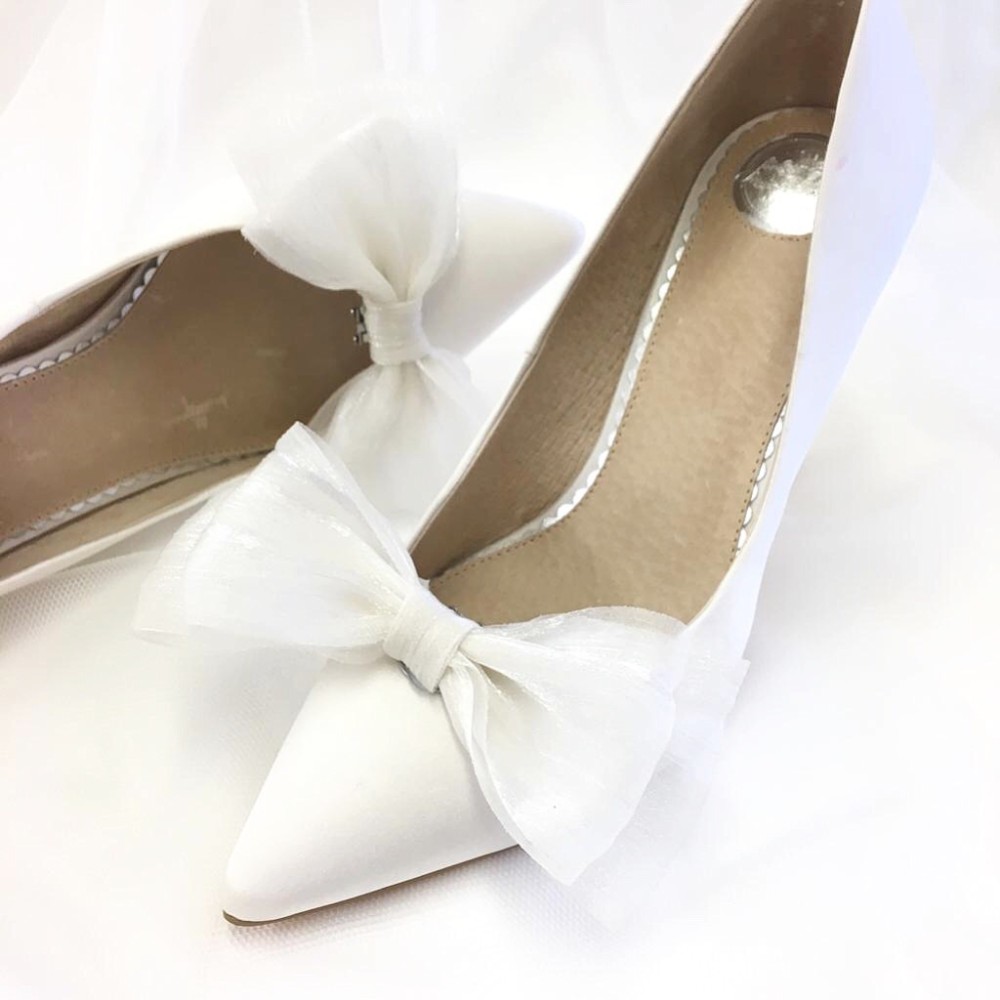 Photograph of Perfect Bridal Daphne Ivory Organza Bow Shoe Clips