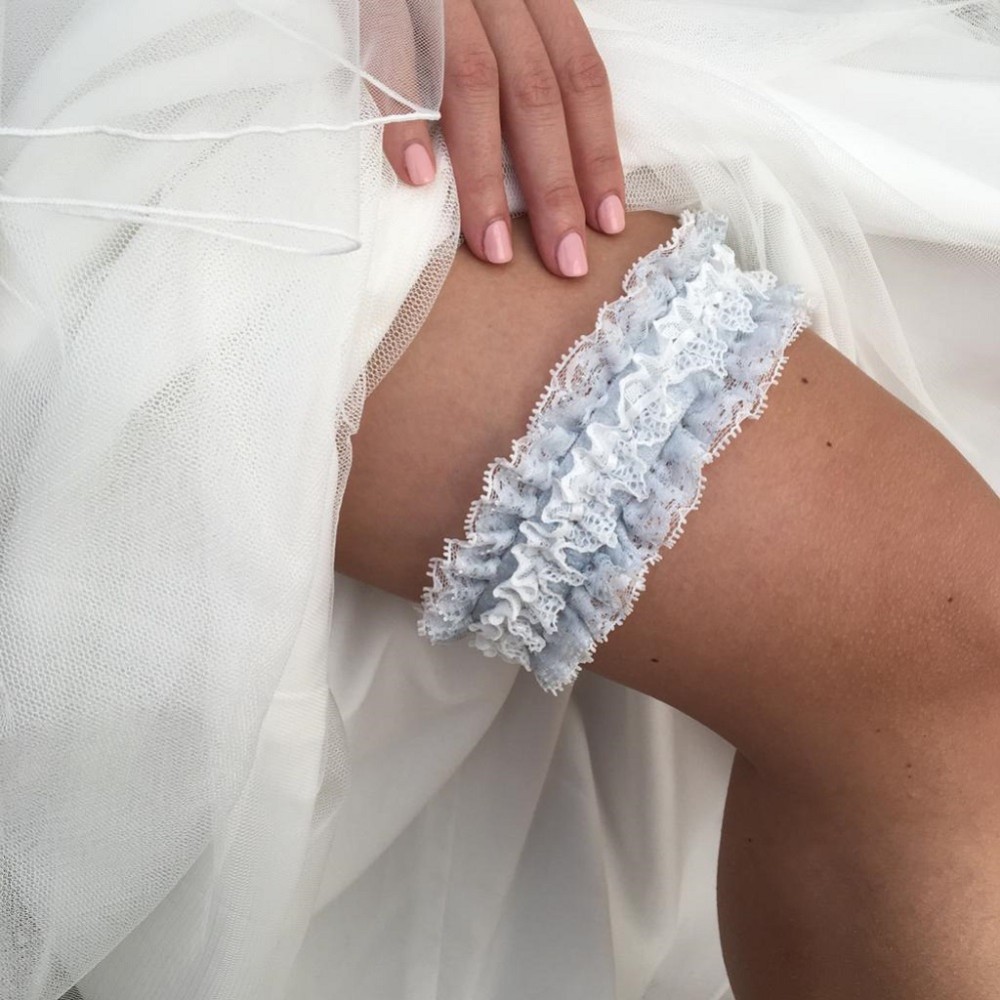 Photograph of Temptation Powder Blue and Ivory Lace Wedding Garter
