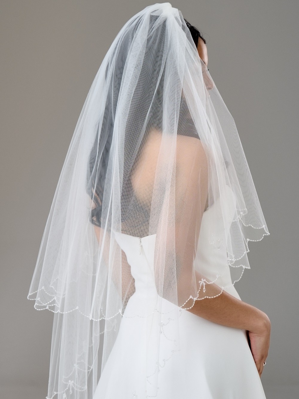 Photograph: Atlanta Two Tier Beaded Scalloped Edge Veil with Crystal Drops