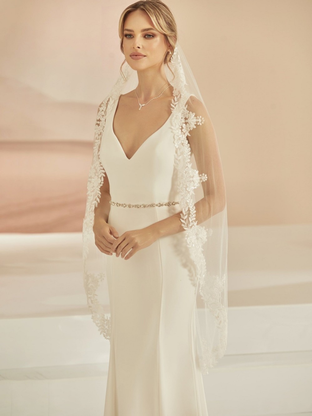 Photograph: Bianco Ivory Single Tier Sequinned Floral Lace Fingertip Veil S412