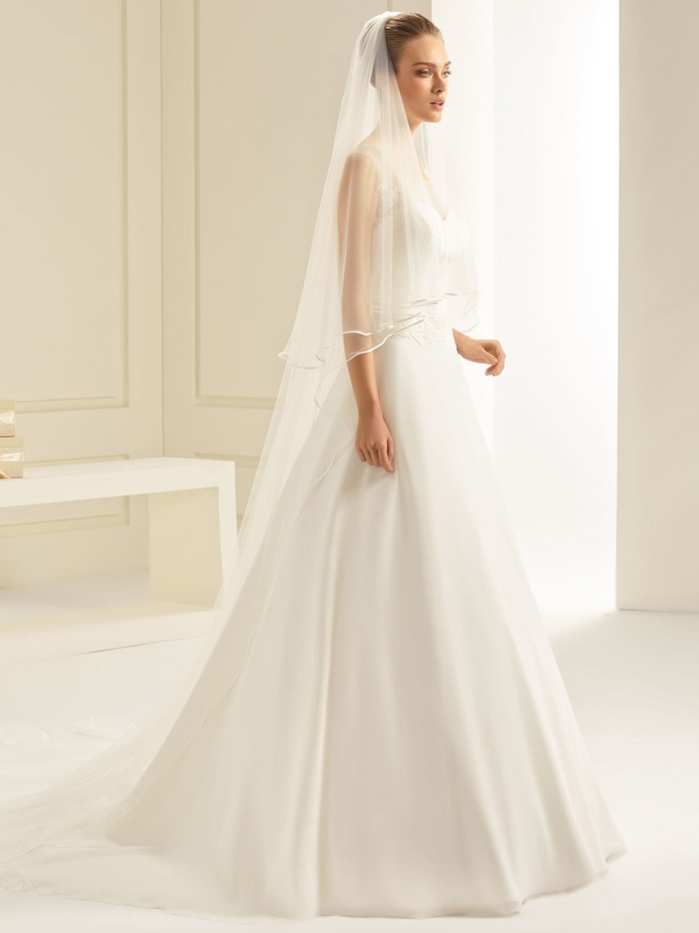 Photograph of Bianco Ivory Soft Tulle Two Tier Satin Edge Cathedral Veil S241