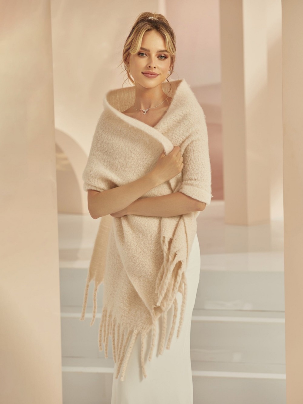 Photograph of Bianco Knitted Wedding Shawl with Tassels E383
