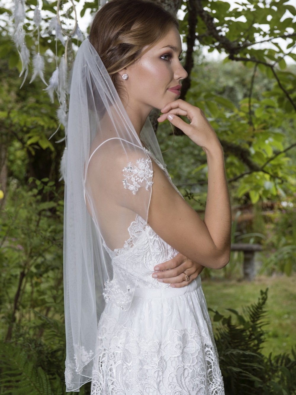 Photograph of Joyce Jackson Cosmos Single Tier Veil with Scattered Lace Motifs