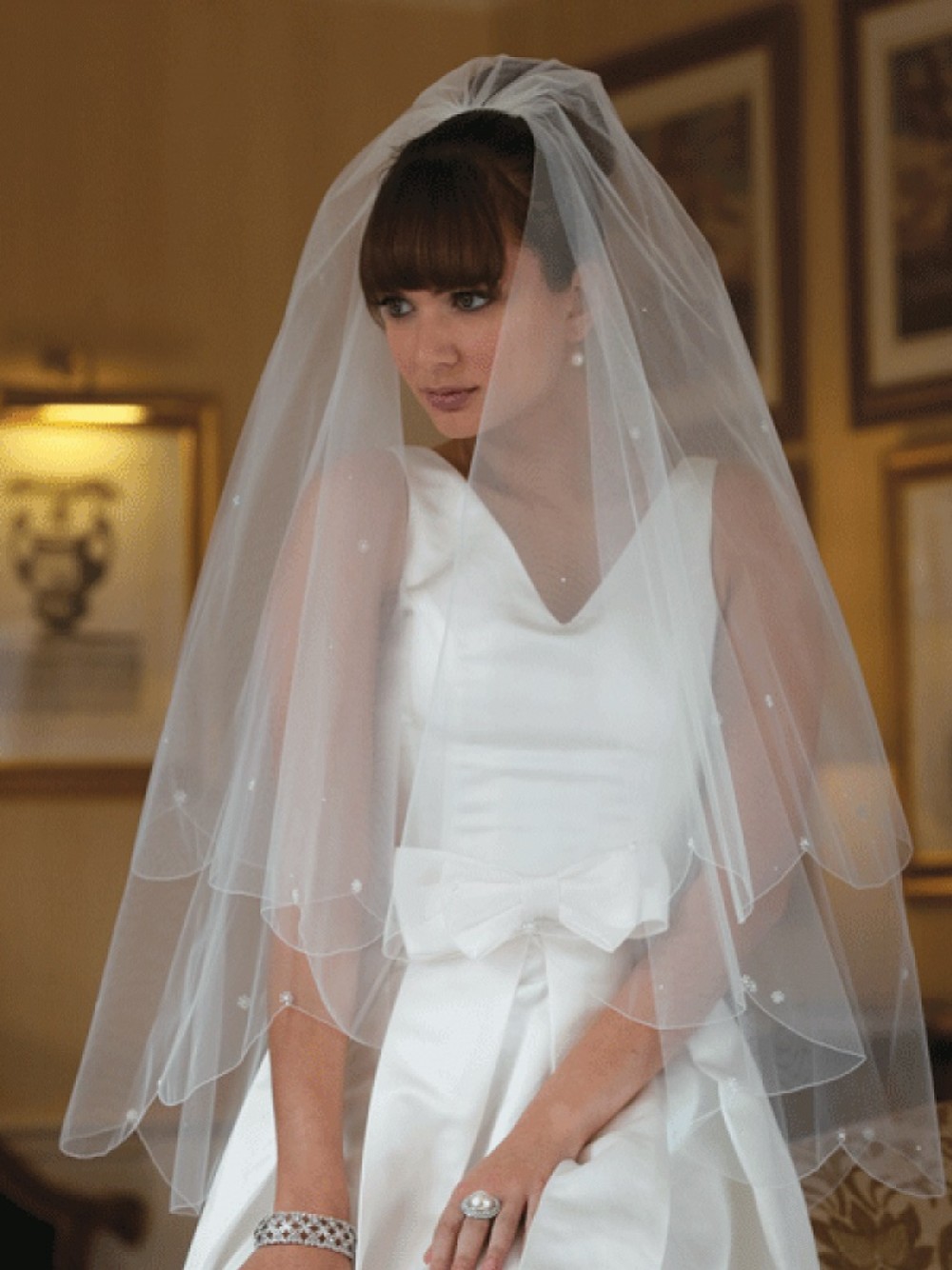 Photograph of Joyce Jackson Marrakesh Scalloped Edge Veil with Pearl and Crystal