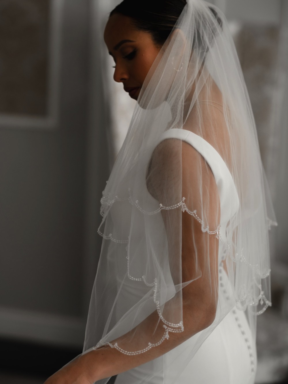 Photograph of Linzi Jay Beaded Scalloped Edge Fingertip Veil with Crystal Drops LA941
