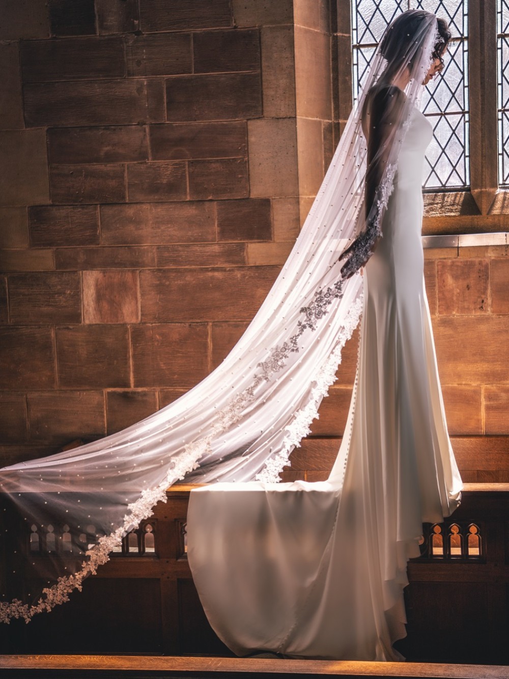 Photograph: Perfect Bridal Ivory Single Tier Pearl Embellished Veil with Floral Lace Edge