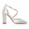 Classic Ivory Cross Strap Courts with an Envelope Clutch