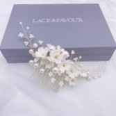 Photograph: Anemone Ivory Porcelain Flowers and Pearl Wedding Hair Comb (Silver)