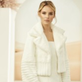 Photograph: Bianco Ivory Faux Fur Long Sleeve Bridal Jacket with Collar E314