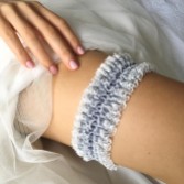 Photograph: Bliss Denim Blue and Ivory Lace Reversible Wedding Garter