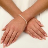 Fotografia: Bracciale Adelina con perle d'acqua dolce e catena