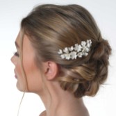 Photograph: Camellia Ivory Porcelain Flower Gold Hair Comb