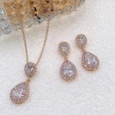 Photograph: Celeste Rose Gold Crystal Embellished Wedding Jewellery Set