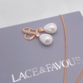 Photograph: Dolci Rose Gold Crystal Embellished Teardrop Pearl Earrings