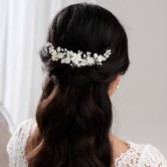 Photograph: Edelweiss Ivory Porcelain Flowers and Pearl Wedding Hair Comb