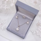 Photograph: Evie Dainty Pearl Stud Earring and Pendant Jewelry Set