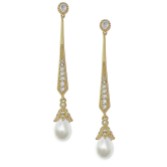 Photograph: Geneva Long Pearl Drop Wedding Earrings (Gold)