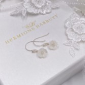 Photograph: Hermione Harbutt Bianca Mother of Pearl Flower Droplet Earrings